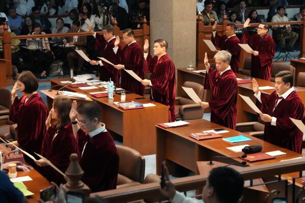 Philippine justice chief orders arrest of senator wanted by the ICC over Duterte-era killings
